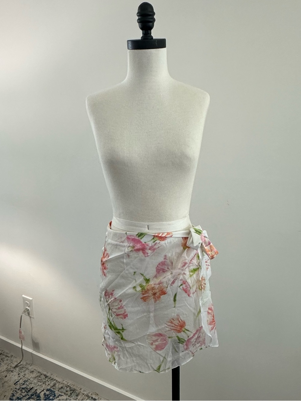 Leggiadro White Floral Tie-Wrap Mini Skirt with Pink & Green Accents